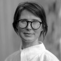 Black and white photograph of Curator Pippa Milne.
